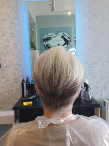 Women’s short haircut at Snippers and Clippers hair salon