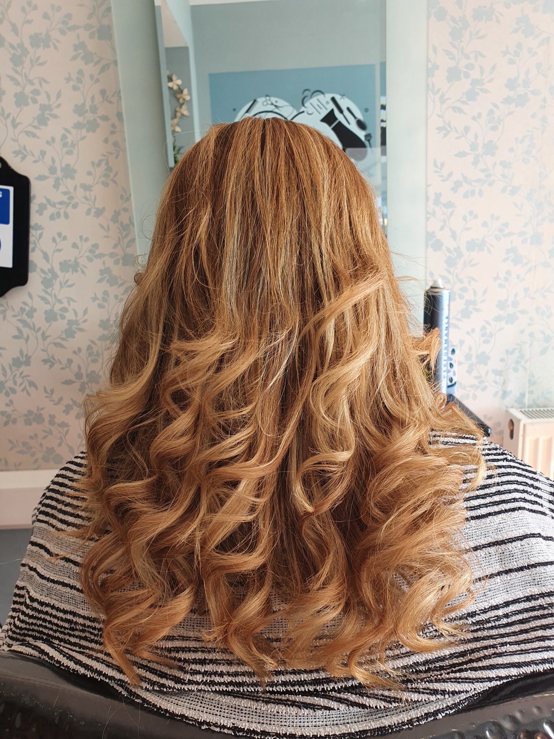 Women’s textured long hair at Snippers and Clippers salon