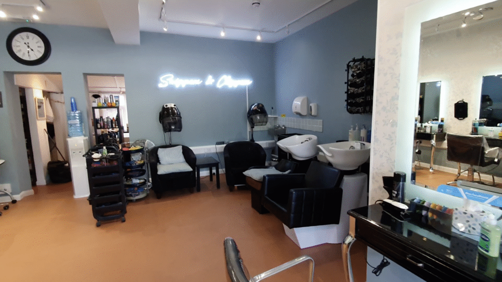 Snippers and Clippers salon interior with styling stations