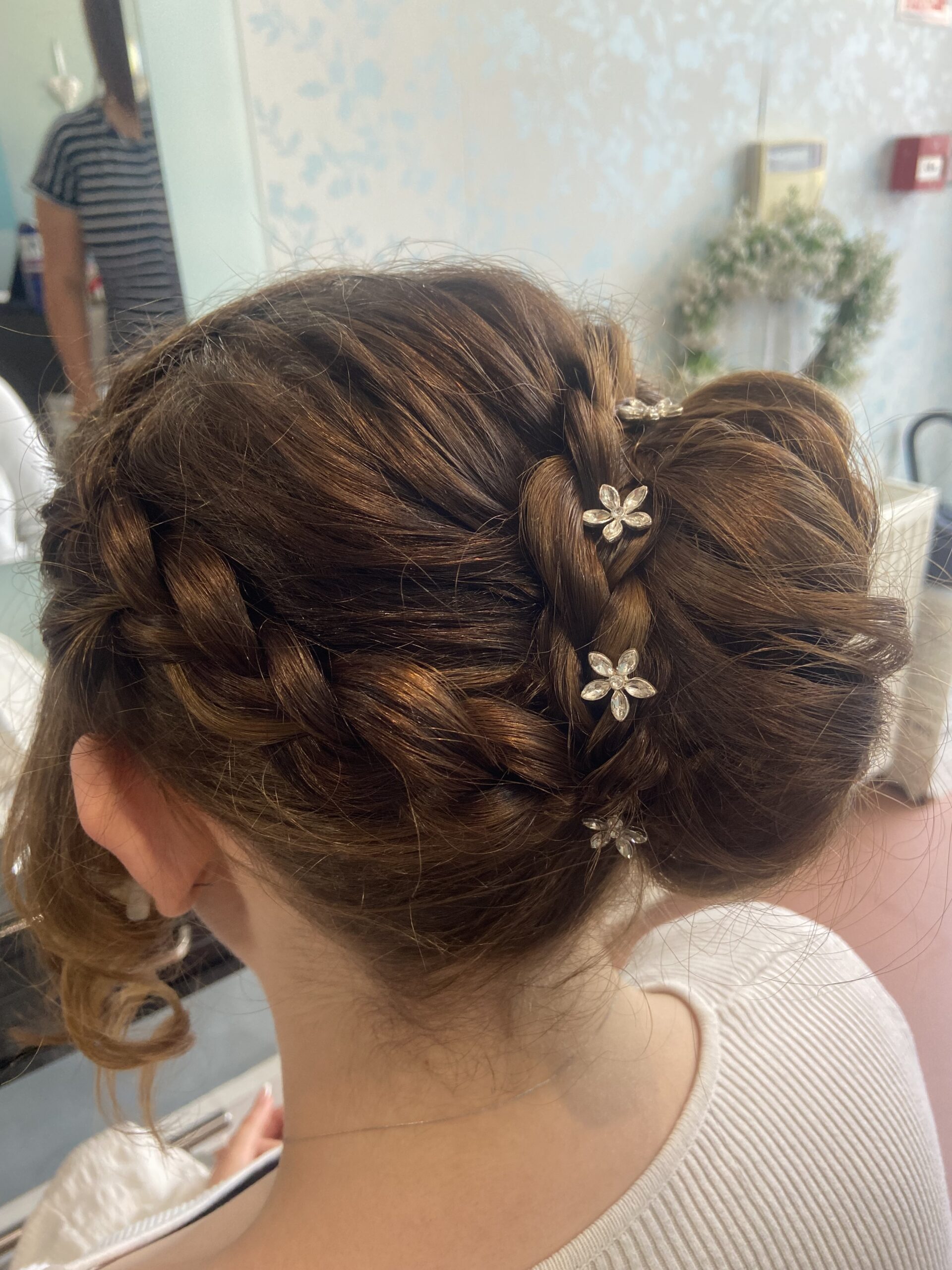 girls hair styled delicately by snippers and clippers